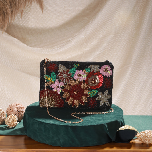 Beautiful multi-colored beaded and sequin clutch with silky tussle