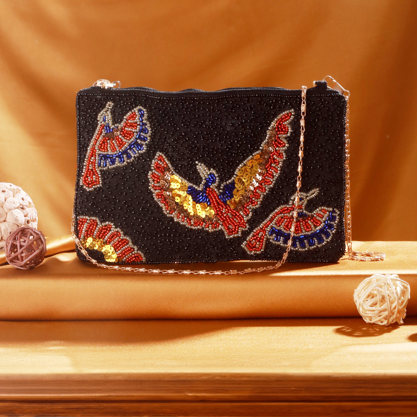 Beautiful multi-colored beaded and sequin clutch with tussle