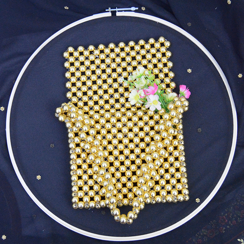 Handmade Golden beaded bag with flap