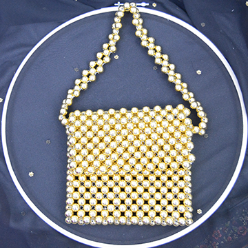 Handmade Golden beaded bag with flap