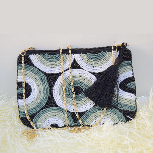 Handmade multi color beaded clutch, Beautifully made by women artisan of villages in India.