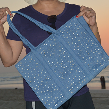 Denim tote bag with pearls, and stone work on front side